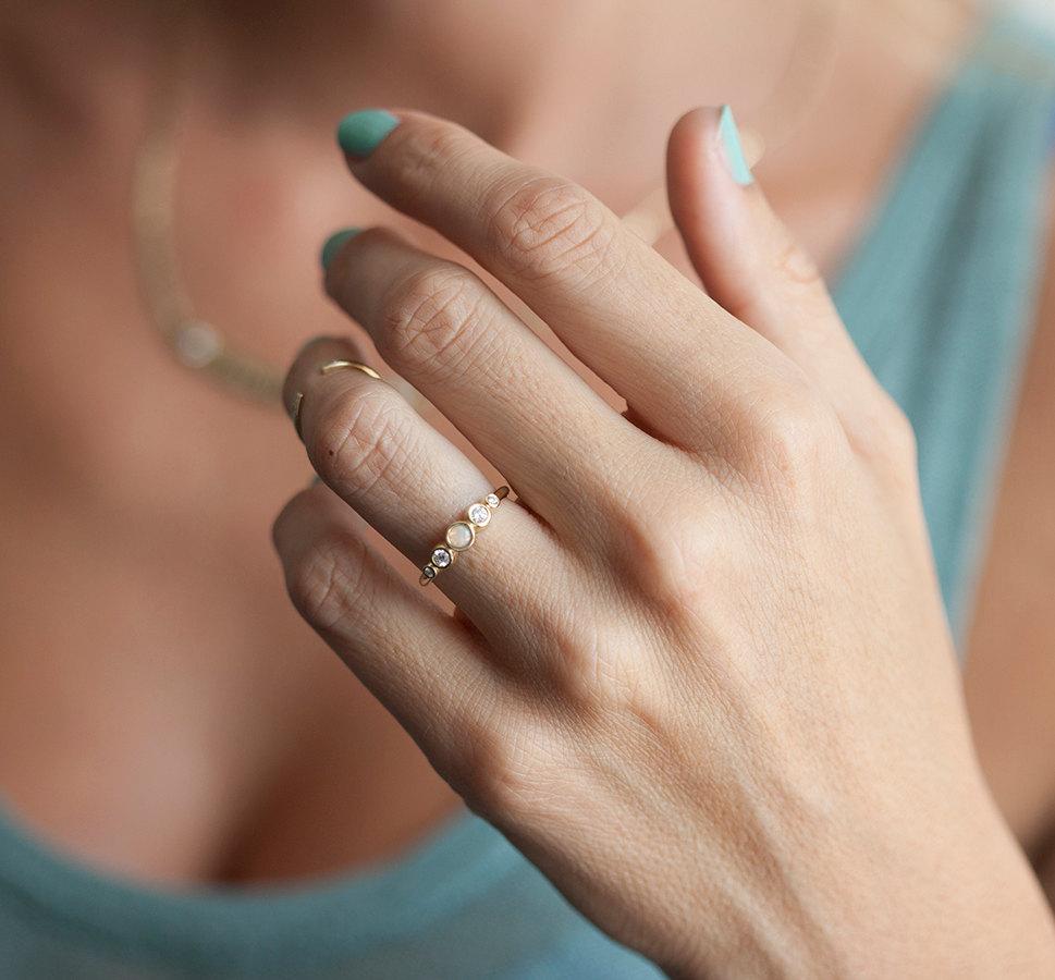 Round Opal Ring with Round White Symmetrically Placed Diamonds